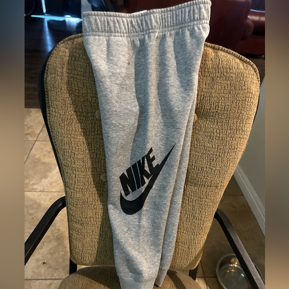 NWT grey Nike sweatpants , size 4-5 youth boys.  Trades and offer welcome